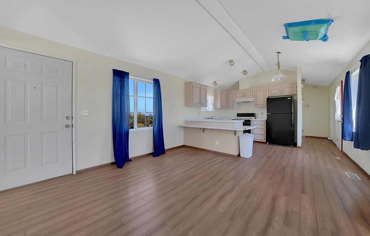 3155 Hawver Road San Andreas, CA 95249 - Photo 37 of 62 a view of a kitchen with wooden floor and a kitchen