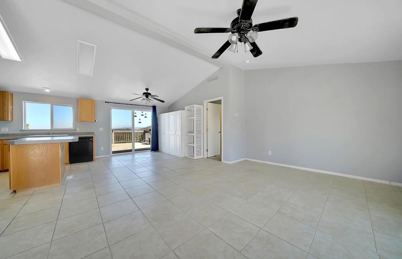 3155 Hawver Road San Andreas, CA 95249 - Photo 8 of 62 a view of a kitchen with furniture and a ceiling fan