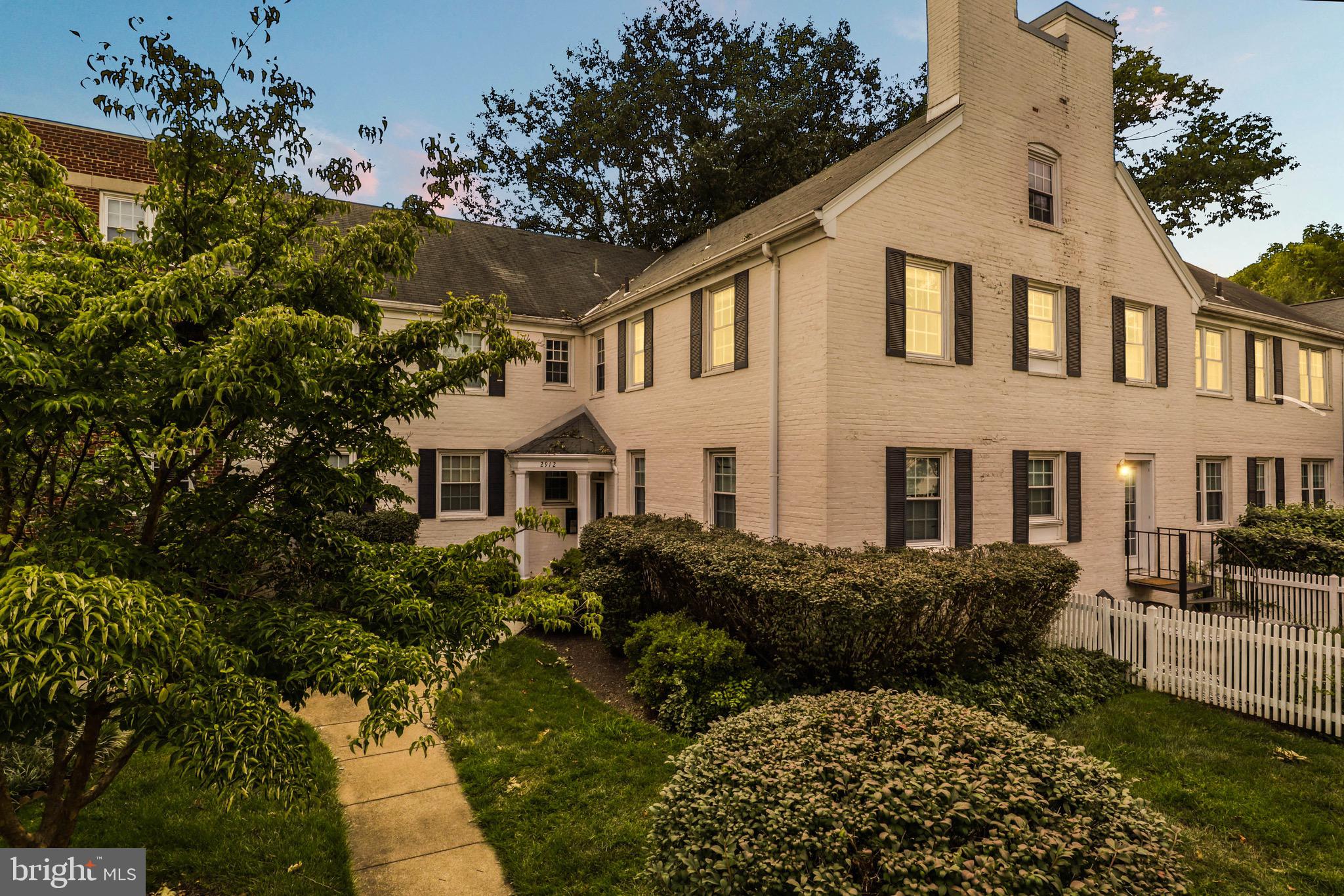 2912 13th Road South, Unit 204 Arlington, VA 22204 - Photo 32 of 32 a front view of a house with a garden