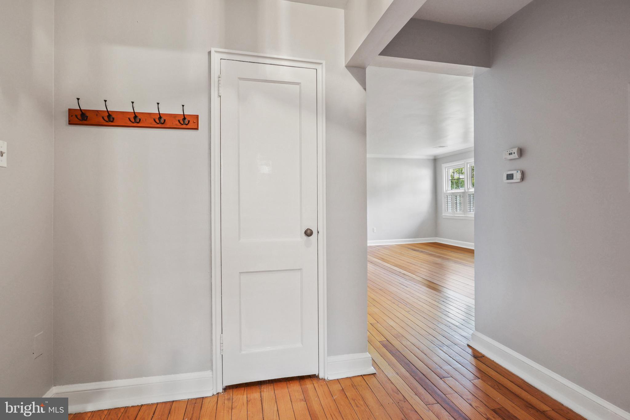 2912 13th Road South, Unit 204 Arlington, VA 22204 - Photo 9 of 32 a view of walk in closet with wooden floor