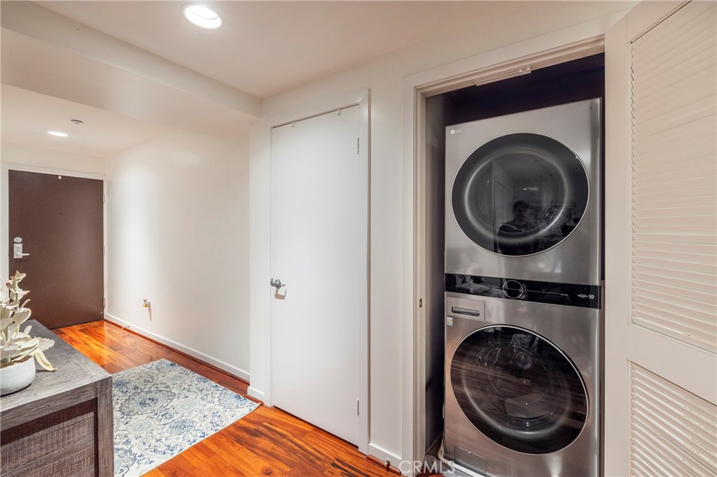 400 West Ocean Boulevard, Unit 902 Long Beach, CA 90802 - Photo 22 of 32 a view of a hallway with washer and dryer