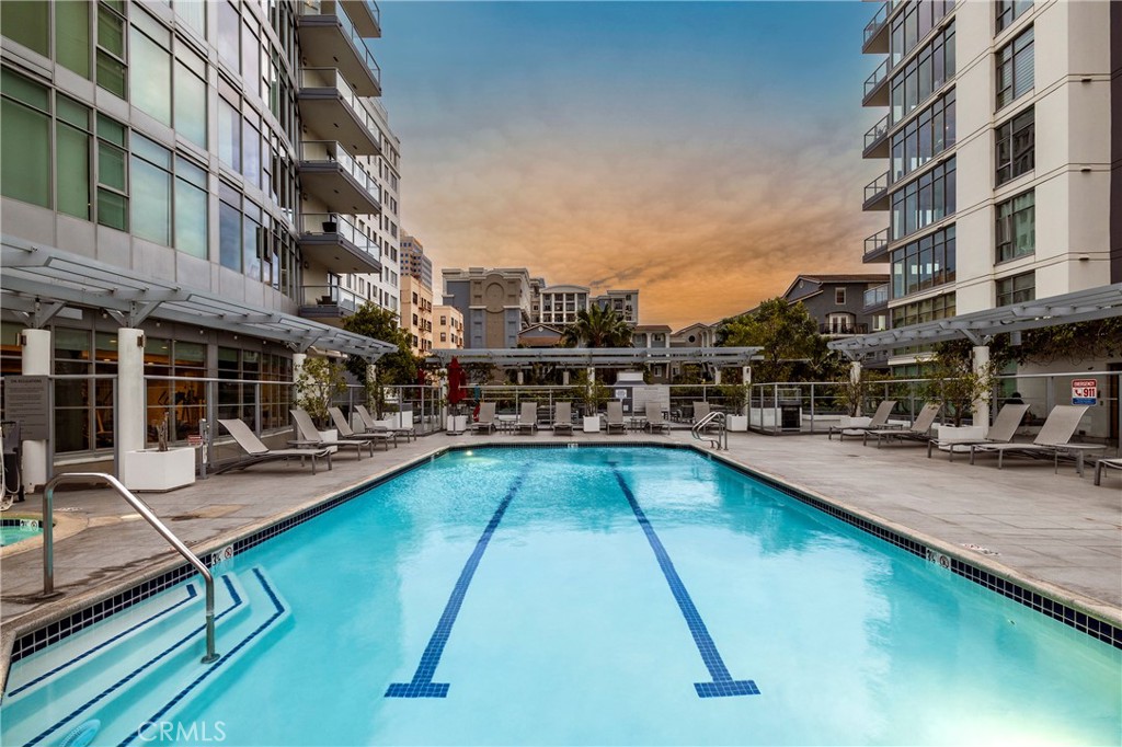 400 West Ocean Boulevard, Unit 902 Long Beach, CA 90802 - Photo 24 of 32 a view of a swimming pool with a lounge chair