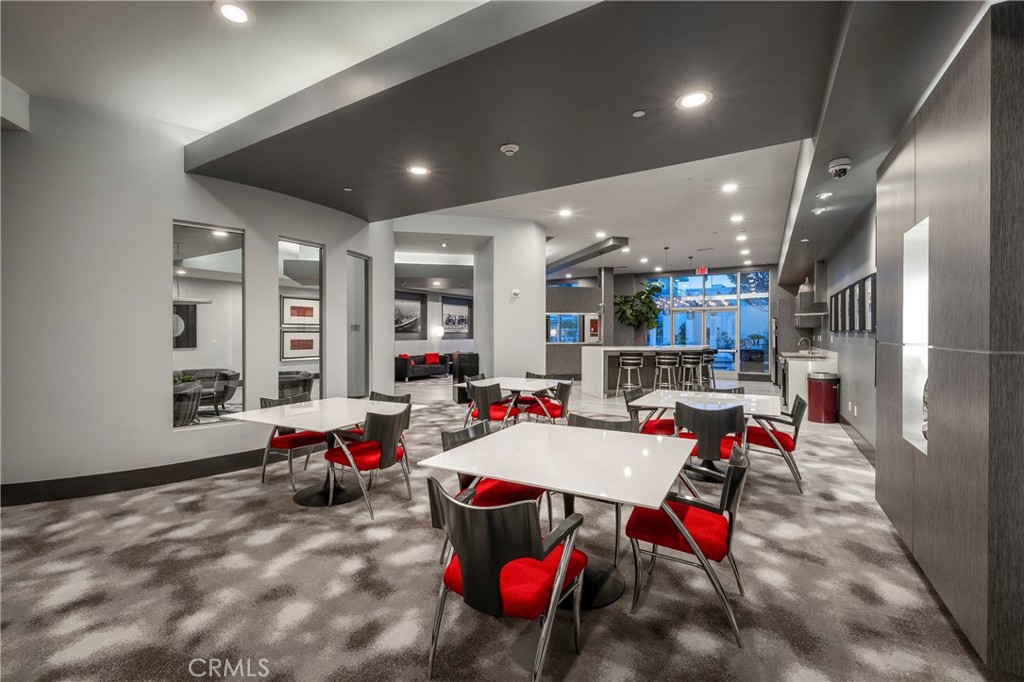400 West Ocean Boulevard, Unit 902 Long Beach, CA 90802 - Photo 30 of 32 a living room with furniture and a wooden floor