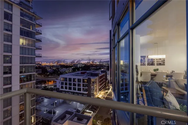 a view of a balcony with city view