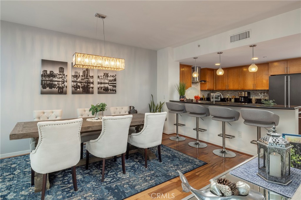 400 West Ocean Boulevard, Unit 902 Long Beach, CA 90802 - Photo 10 of 32 a view of a dining room with furniture
