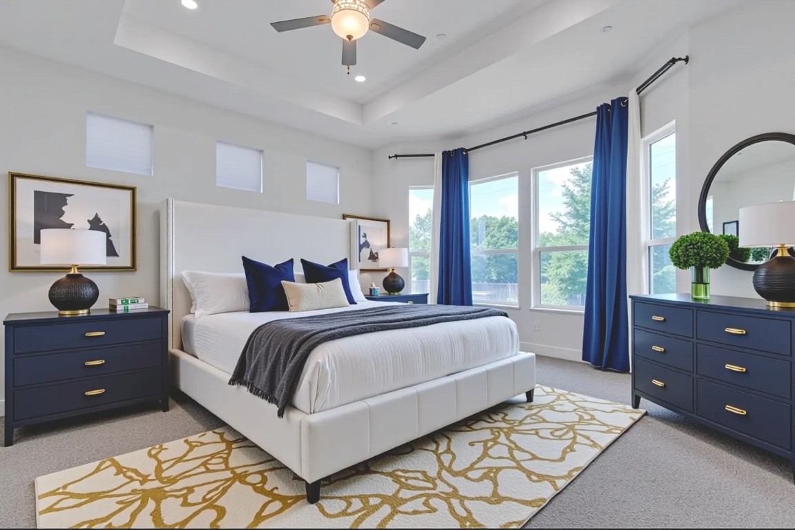 12110 Moriah Bend Austin, TX 78732 - Photo 16 of 40 a bedroom with a bed and a dresser