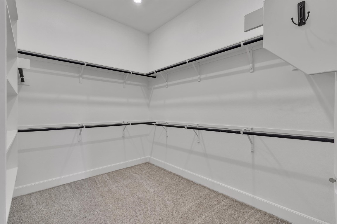 12110 Moriah Bend Austin, TX 78732 - Photo 19 of 40 a view of an empty walk in closet