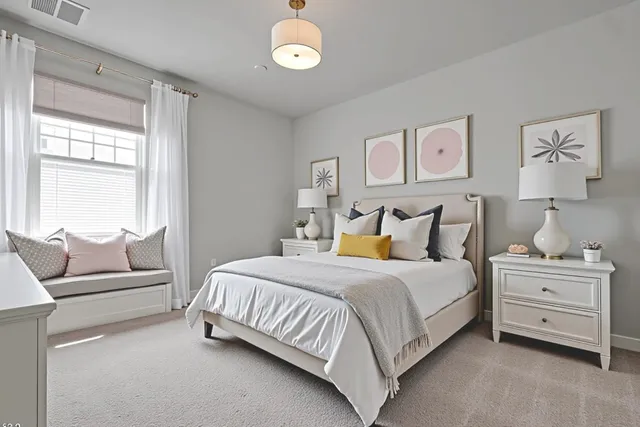 a bedroom with a bed and a couch