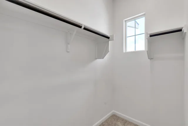 a view of a window in an empty room