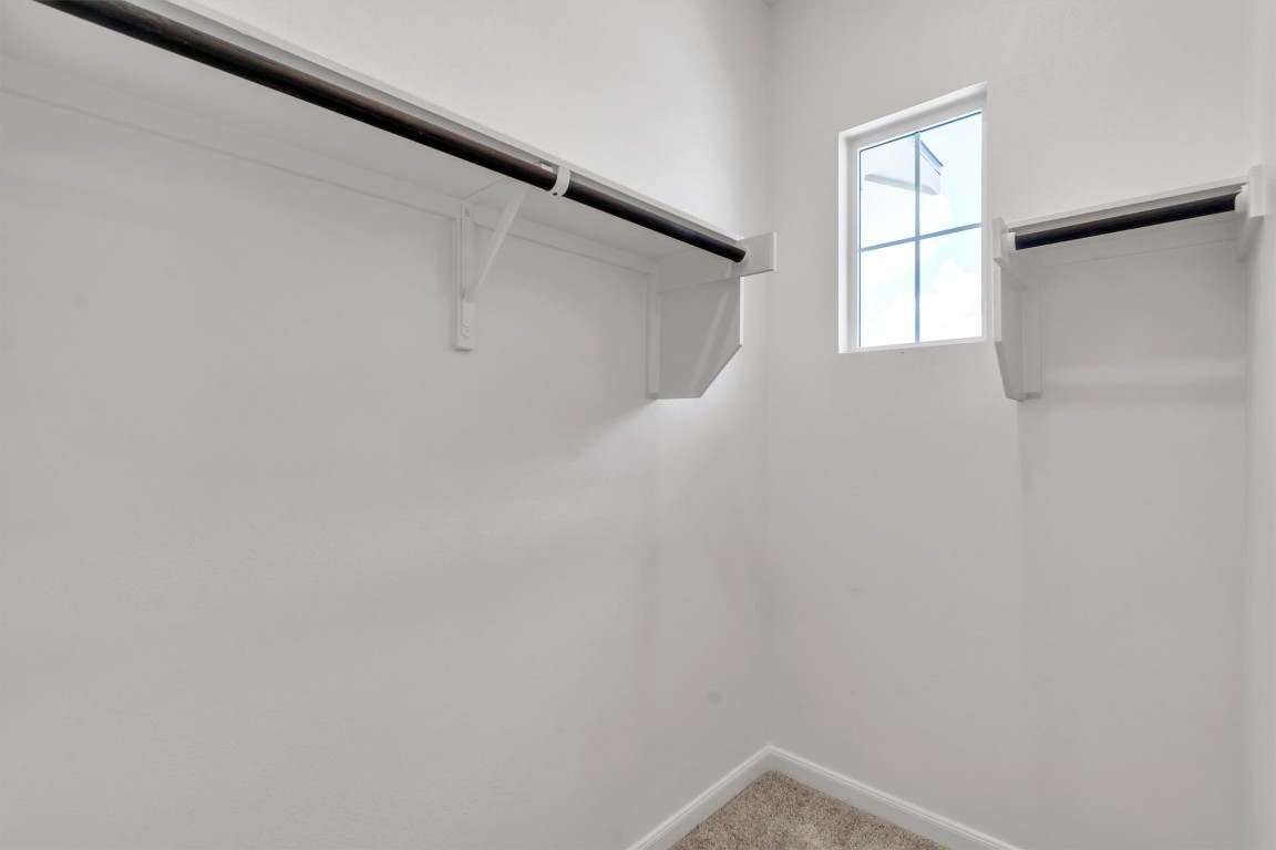 12110 Moriah Bend Austin, TX 78732 - Photo 32 of 40 a view of a window in an empty room