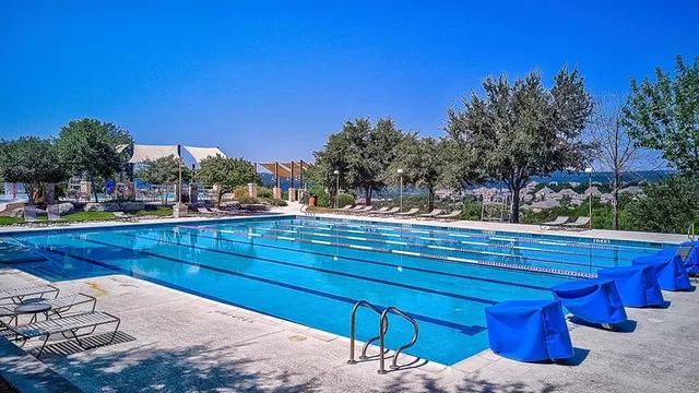 a view of a backyard with sitting area