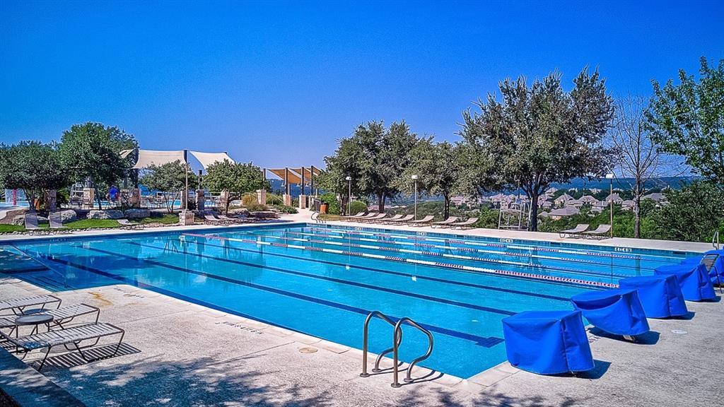 12110 Moriah Bend Austin, TX 78732 - Photo 39 of 40 a view of a backyard with sitting area