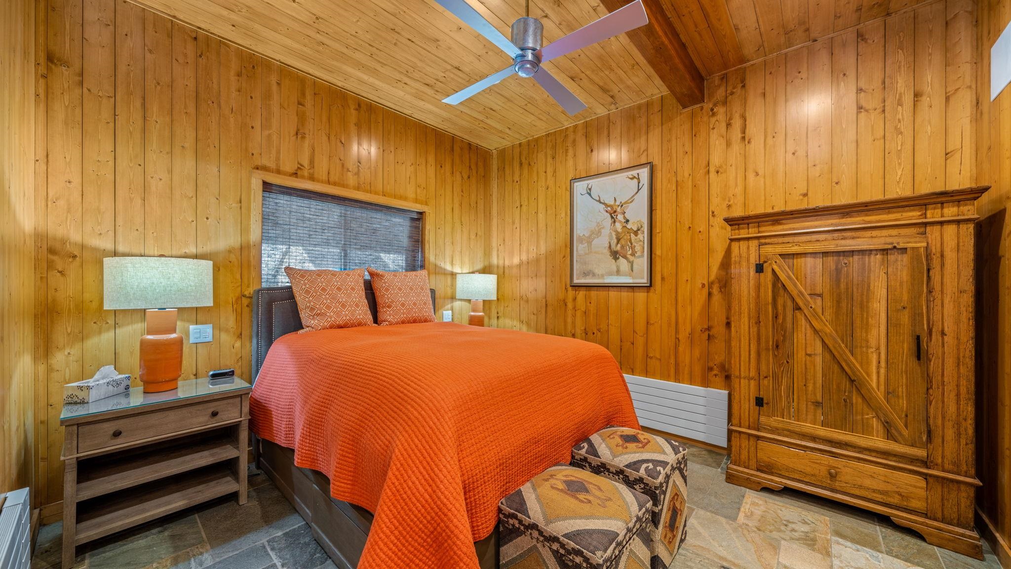 6200 Westside Road Calpine, CA 96124 - Photo 19 of 21 a bedroom with a bed and wooden floor