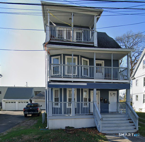 a house view with a garden space