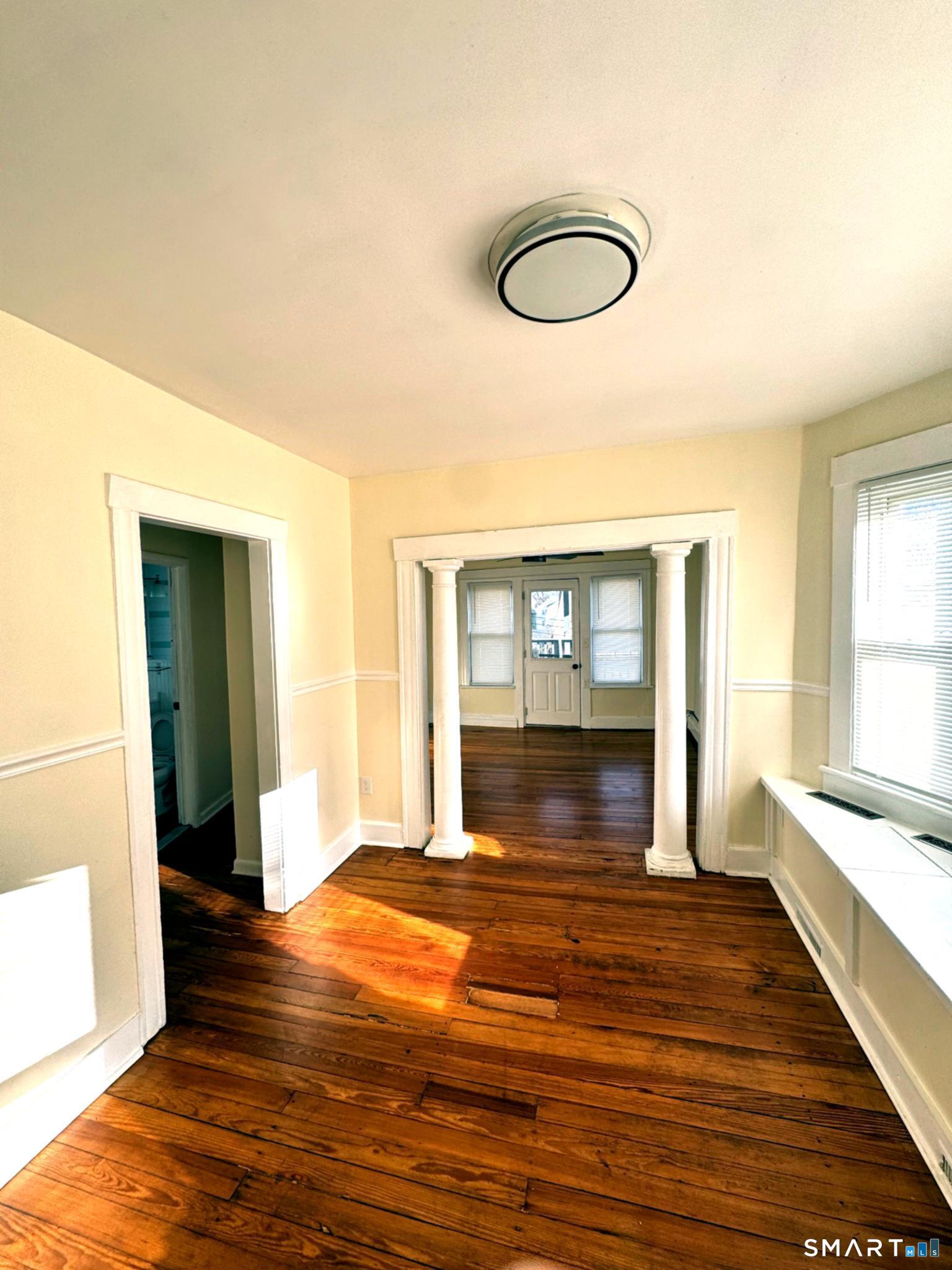 175 Wilson Street, Unit 179 Bridgeport, CT 06605 - Photo 5 of 9 a view of an empty room and window