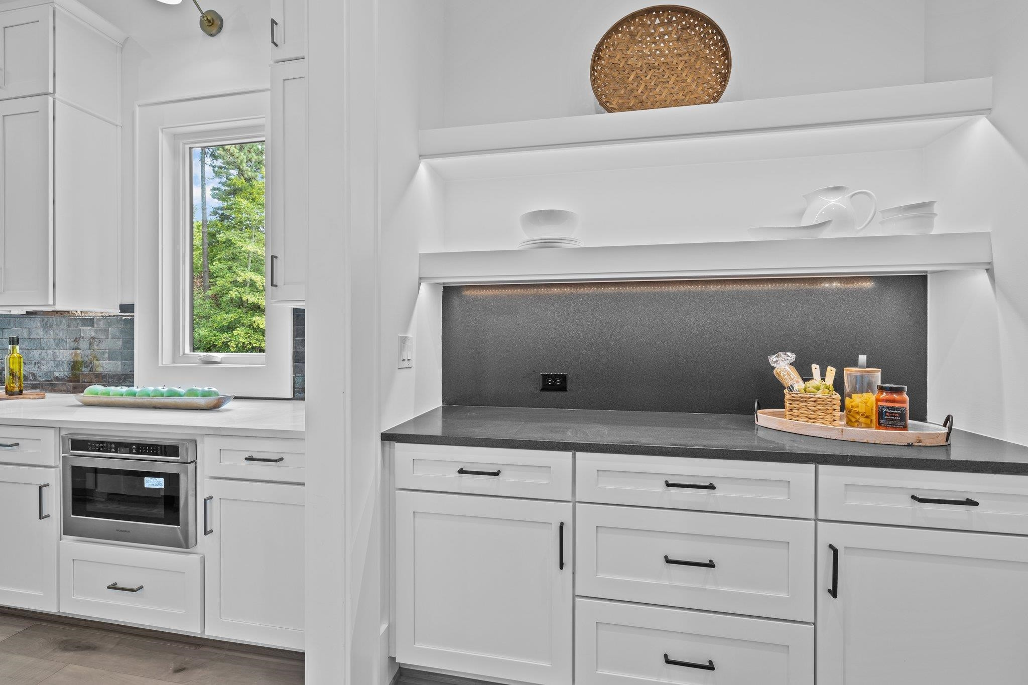 7605 Harps Mill Road Raleigh, NC 27615 - Photo 24 of 70 a kitchen with a cabinets and a stove