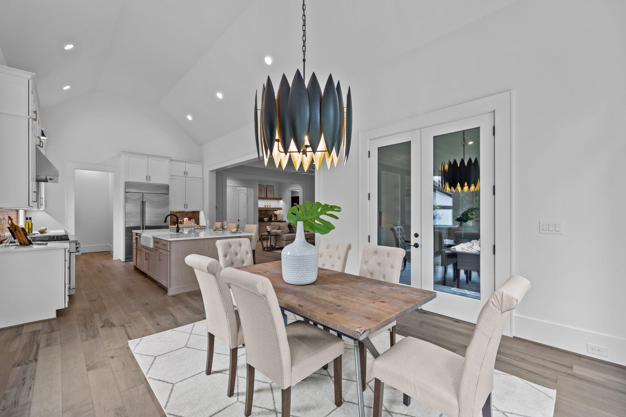 7605 Harps Mill Road Raleigh, NC 27615 - Photo 27 of 70 a view of a dining room with furniture and wooden floor