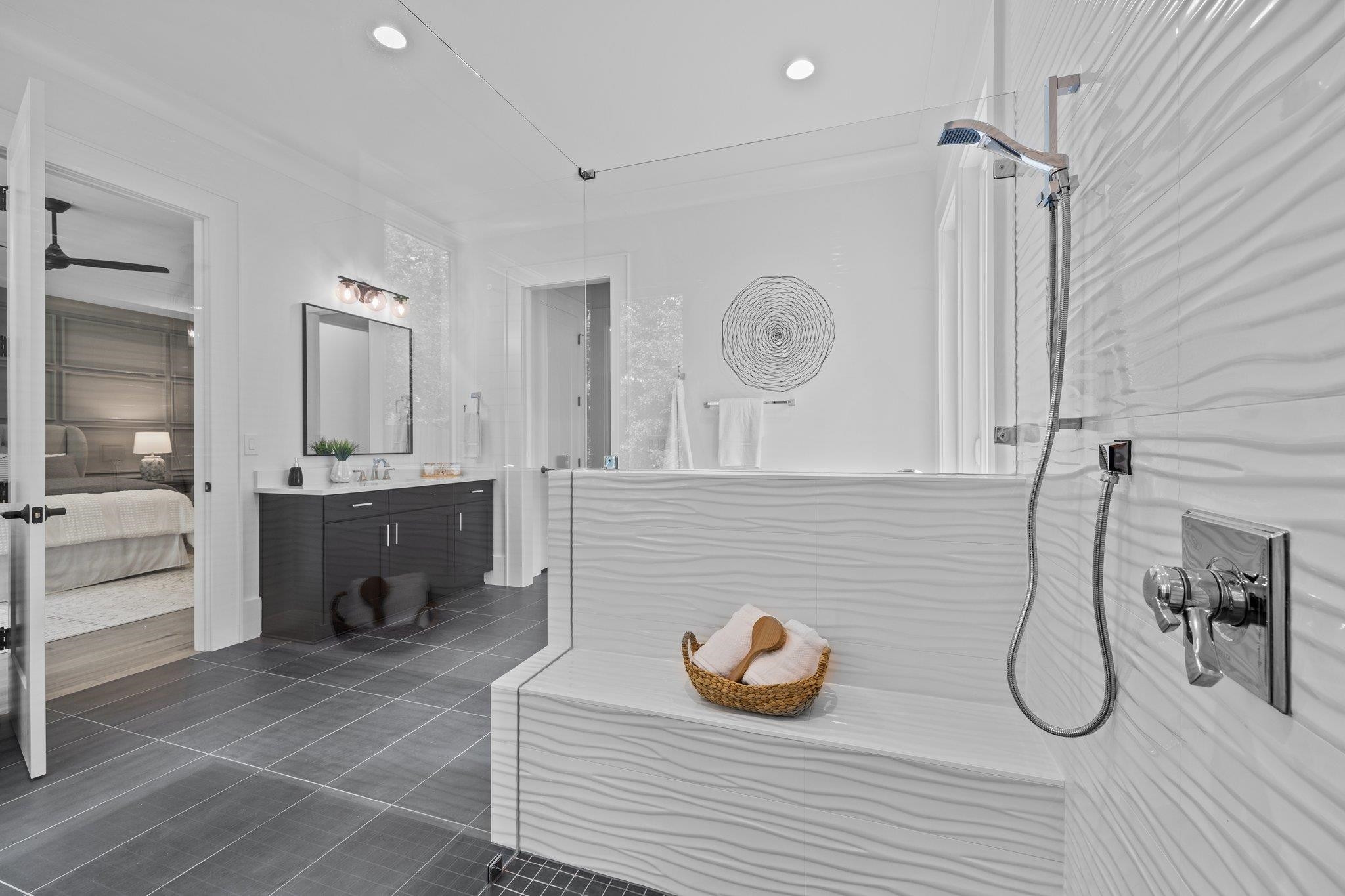 7605 Harps Mill Road Raleigh, NC 27615 - Photo 36 of 70 a bathroom with a sink and a mirror
