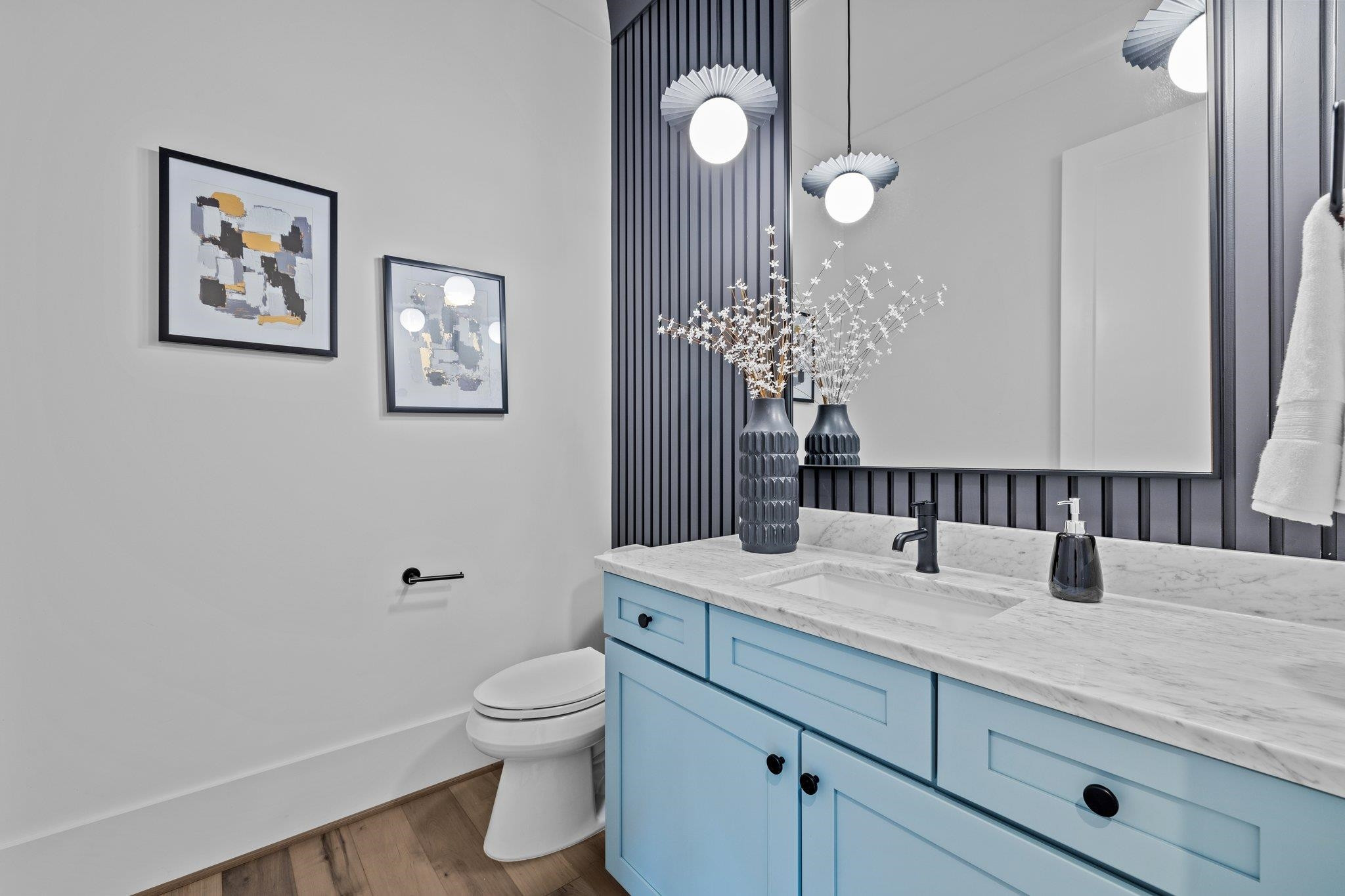 7605 Harps Mill Road Raleigh, NC 27615 - Photo 41 of 70 a bathroom with a granite countertop toilet sink and mirror