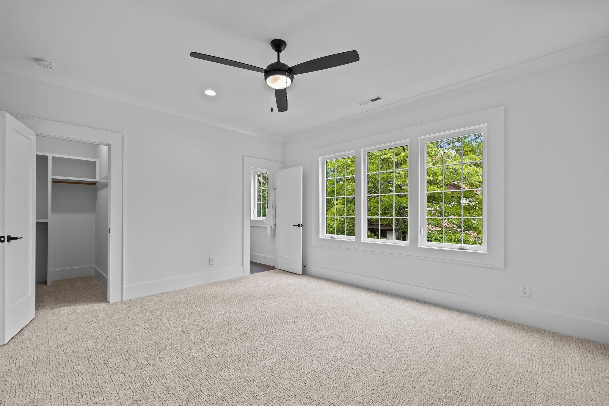 7605 Harps Mill Road Raleigh, NC 27615 - Photo 46 of 70 a view of an empty room with a window