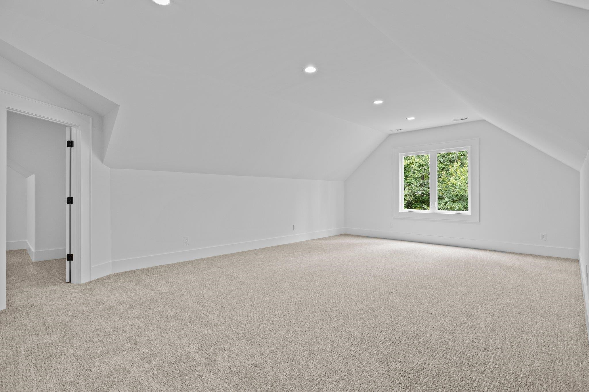 7605 Harps Mill Road Raleigh, NC 27615 - Photo 54 of 70 an empty room with windows