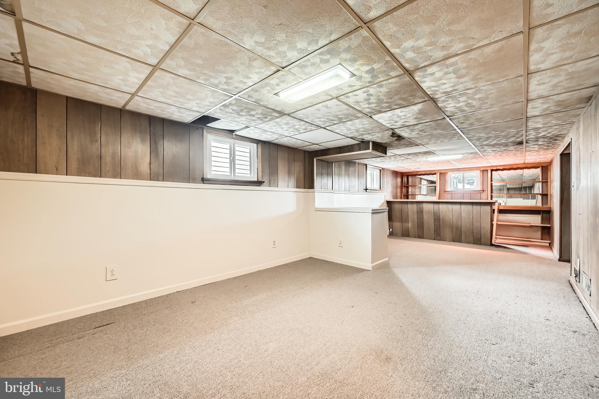 6805 River Drive Road Baltimore, MD 21219 - Photo 16 of 28 a view of an empty room with a garage