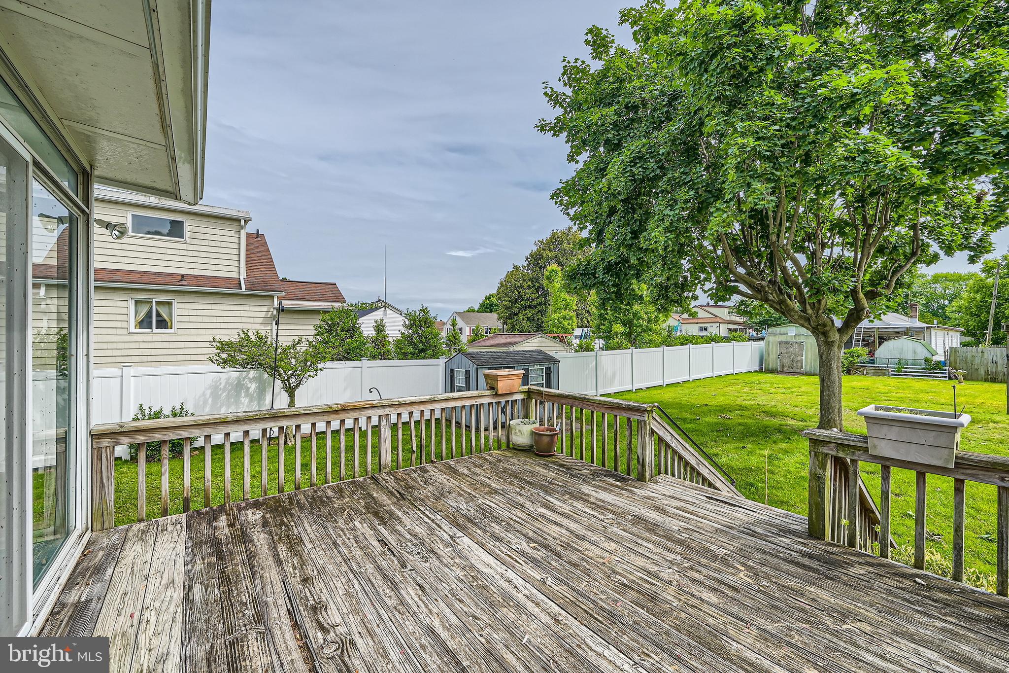 6805 River Drive Road Baltimore, MD 21219 - Photo 23 of 28 a view of a balcony with wooden floor