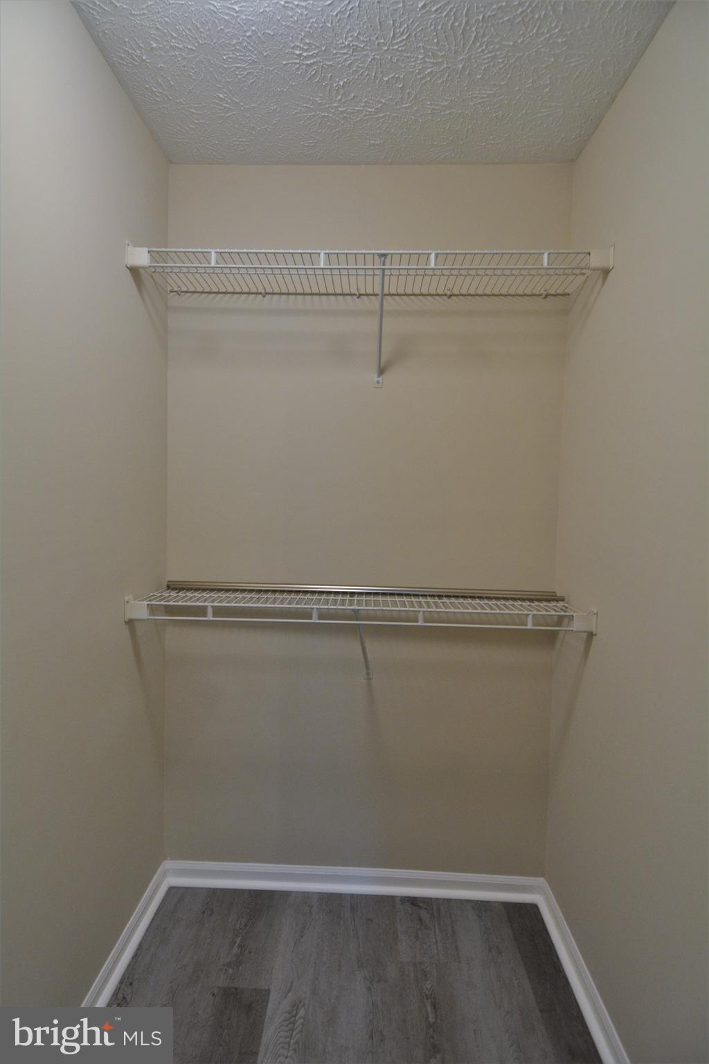 1307 J Clover Valley Way, Unit 1307J Edgewood, MD 21040 - Photo 21 of 25 a view of a room with racks on the wall