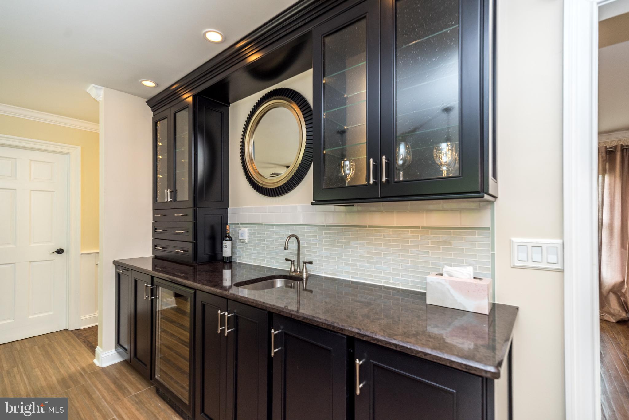 931 West Thatcher Road Quakertown, PA 18951 - Photo 21 of 46 Wet Bar area/ wine/ice quartz