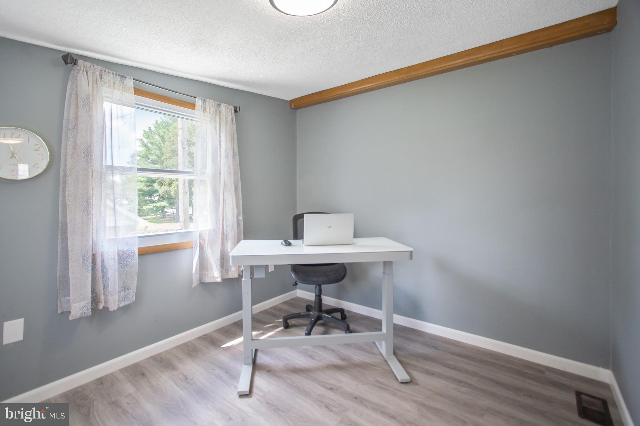 205 South Longcross Road Linthicum Heights, MD 21090 - Photo 23 of 57 a view of a workspace with furniture and a window