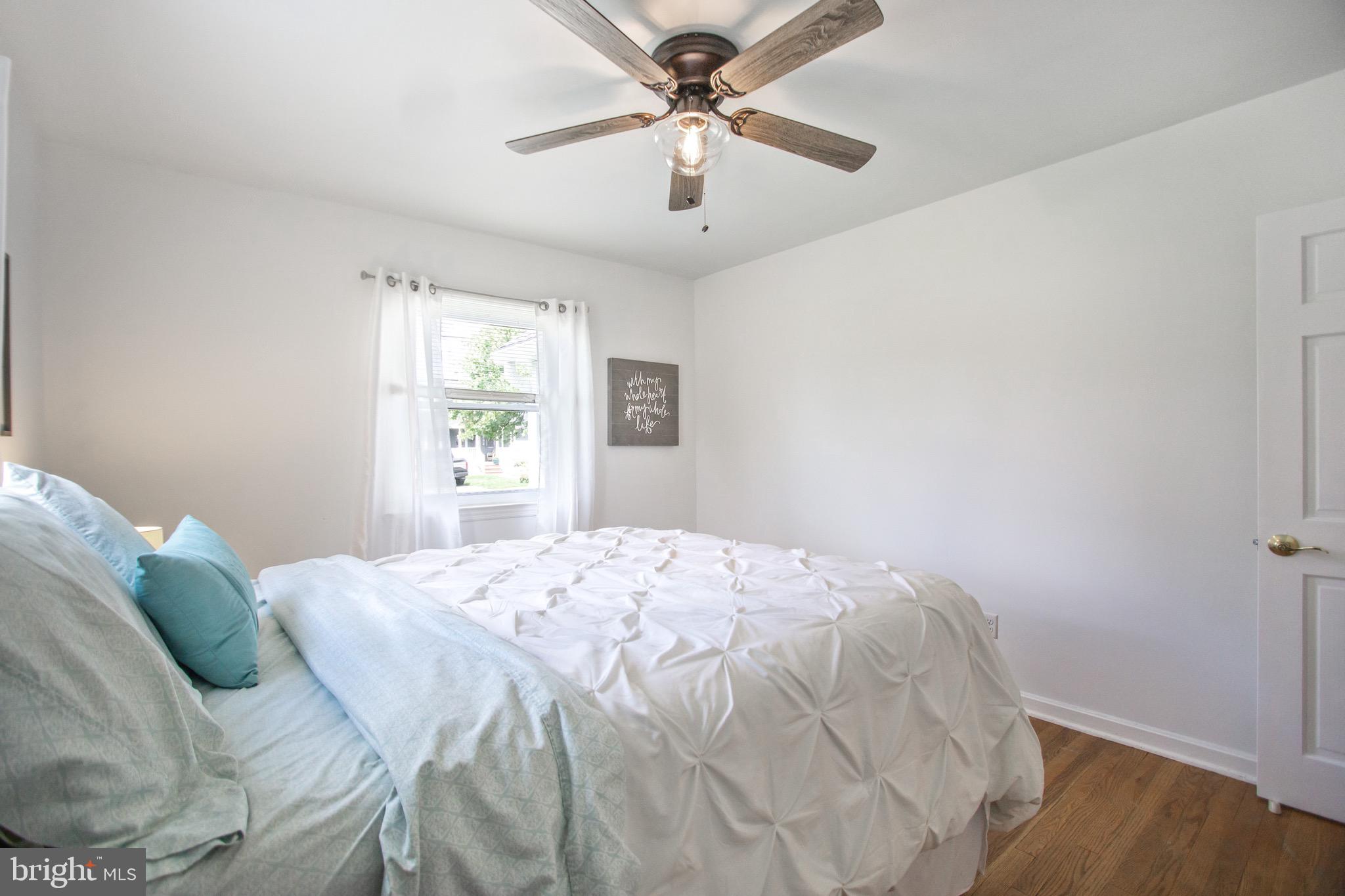 205 South Longcross Road Linthicum Heights, MD 21090 - Photo 26 of 57 a bedroom with a bed and a window