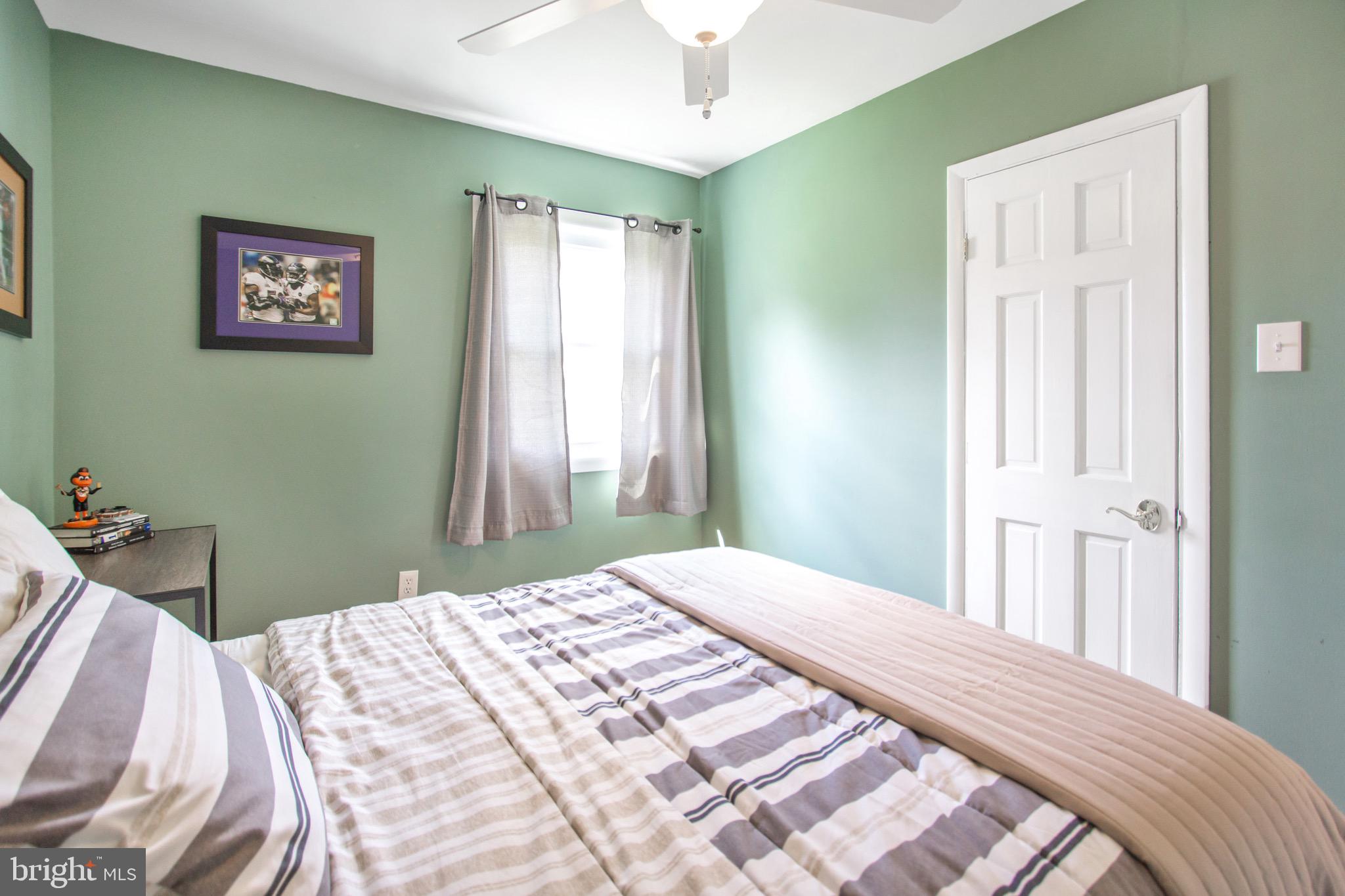 205 South Longcross Road Linthicum Heights, MD 21090 - Photo 28 of 57 a bedroom with a bed and a window