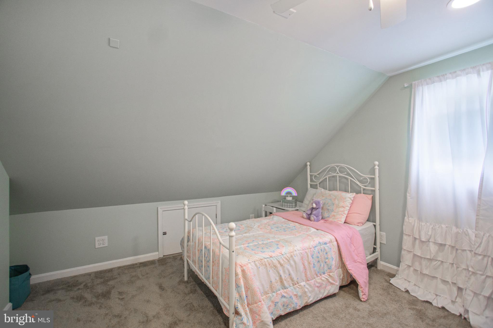 205 South Longcross Road Linthicum Heights, MD 21090 - Photo 35 of 57 a bedroom with a bed and a window