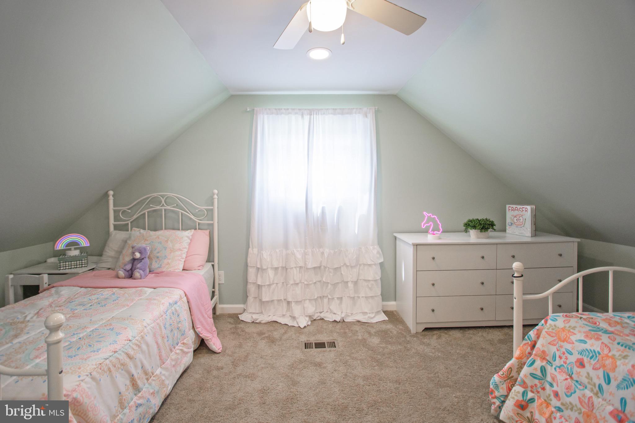 205 South Longcross Road Linthicum Heights, MD 21090 - Photo 39 of 57 a bedroom with a bed and a dresser