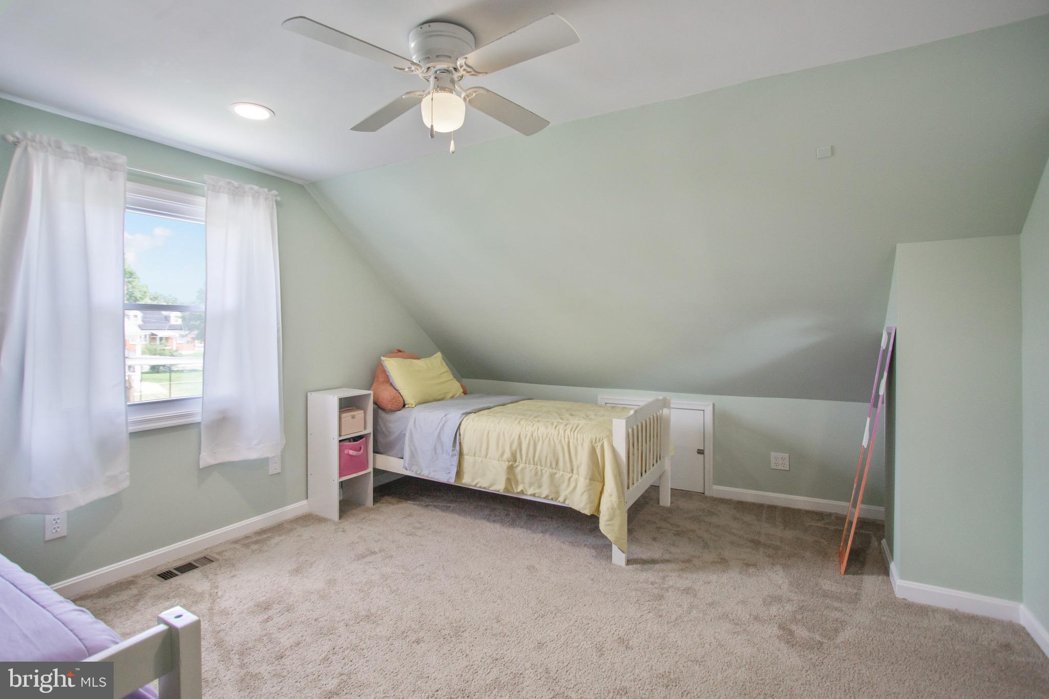205 South Longcross Road Linthicum Heights, MD 21090 - Photo 40 of 57 a bed room with a bed and a window