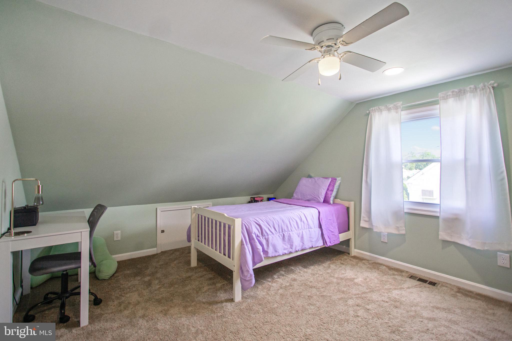 205 South Longcross Road Linthicum Heights, MD 21090 - Photo 41 of 57 a bed room with a bed and a window