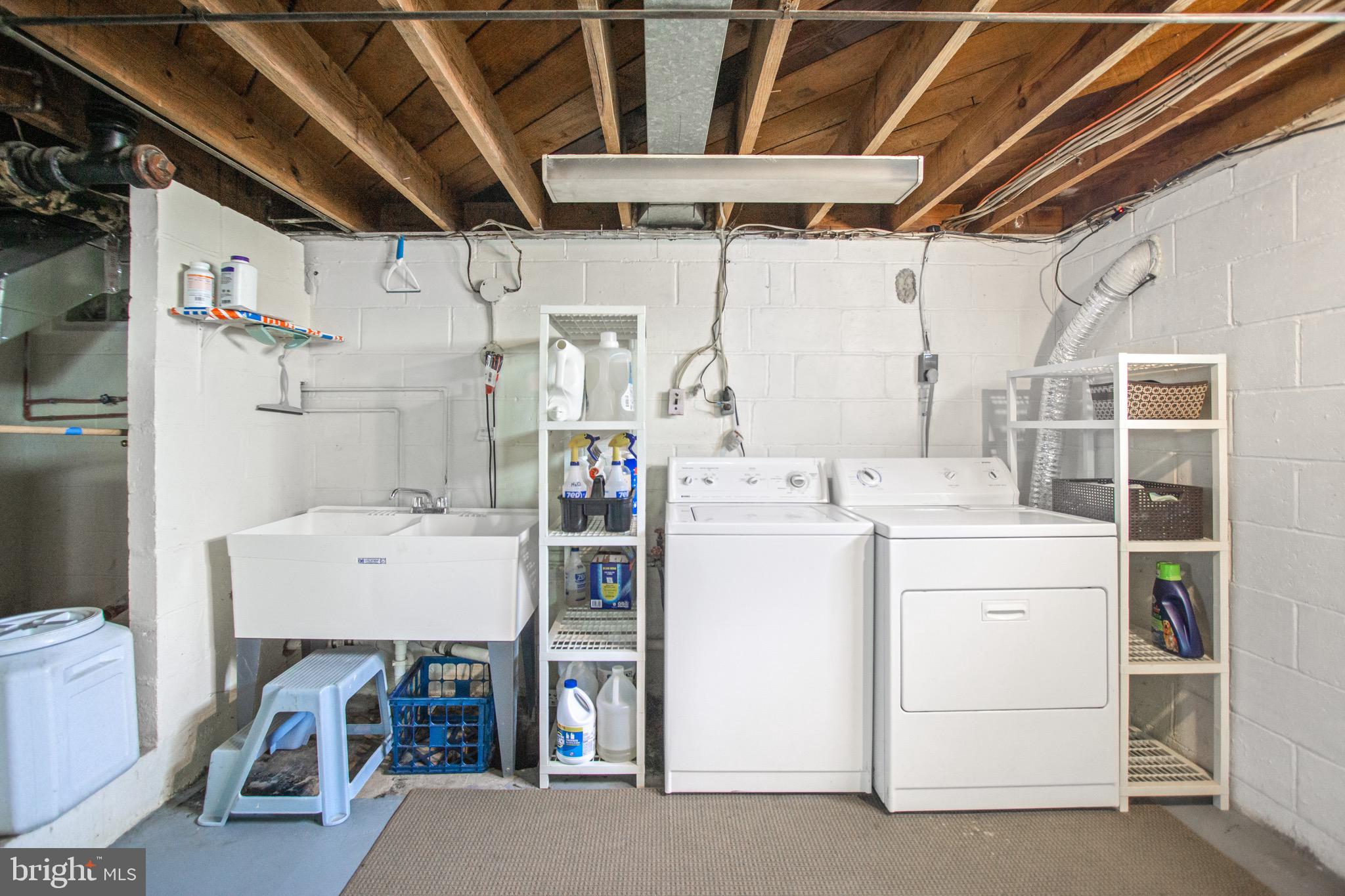 205 South Longcross Road Linthicum Heights, MD 21090 - Photo 45 of 57 a utility room with dryer and washer
