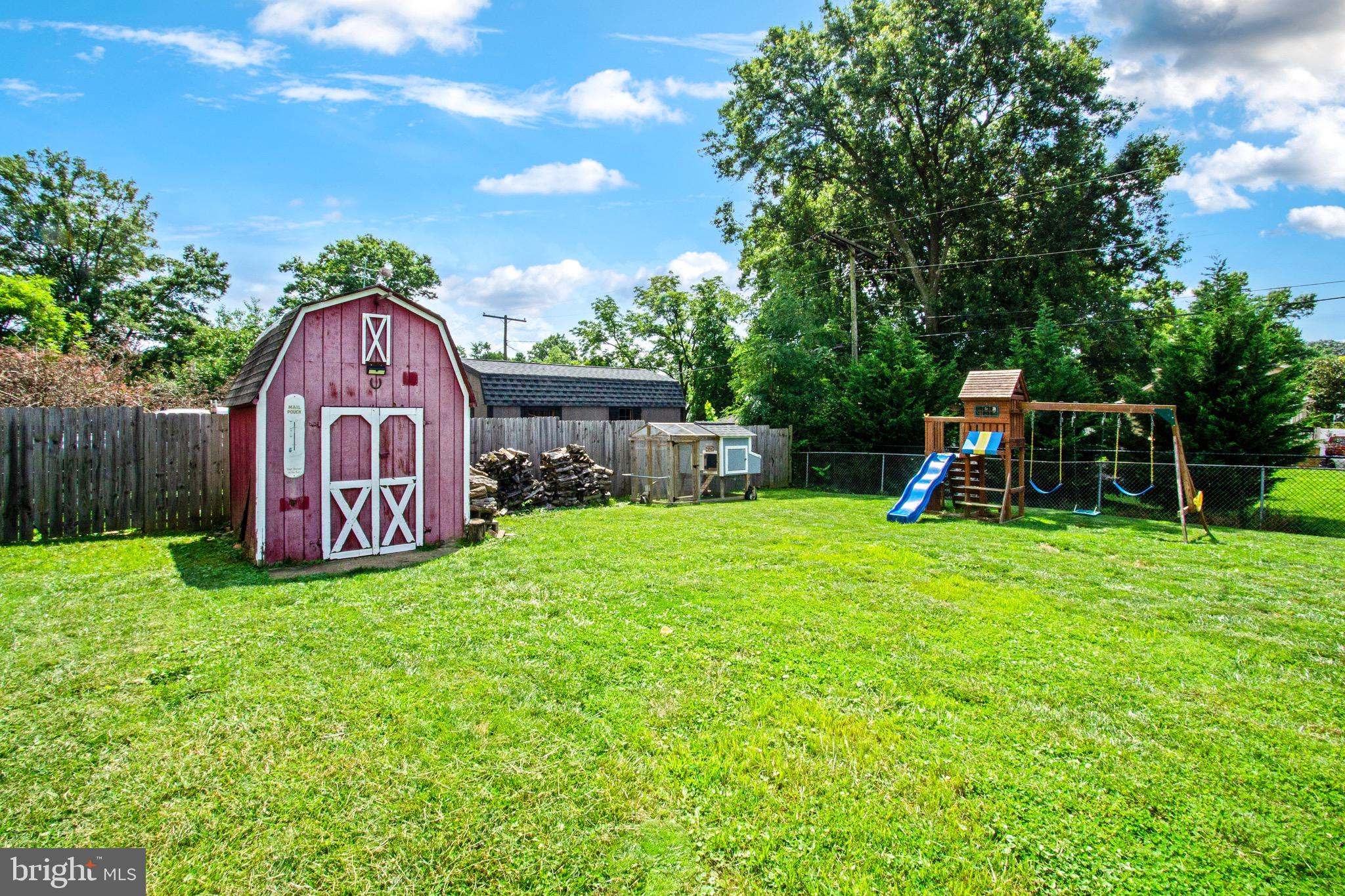 205 South Longcross Road Linthicum Heights, MD 21090 - Photo 52 of 57 a view of a backyard with a garden and entertaining space