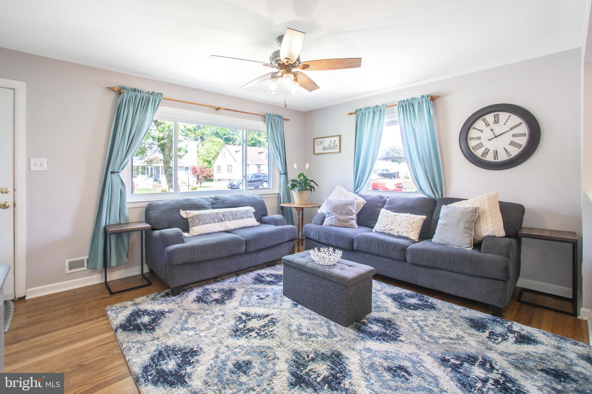 205 South Longcross Road Linthicum Heights, MD 21090 - Photo 6 of 57 a living room with furniture and a large window
