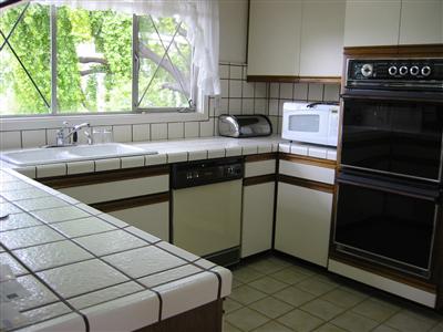 79 Corte Ramon Greenbrae, CA 94904 - Photo 5 of 10 a kitchen with a sink cabinets and window