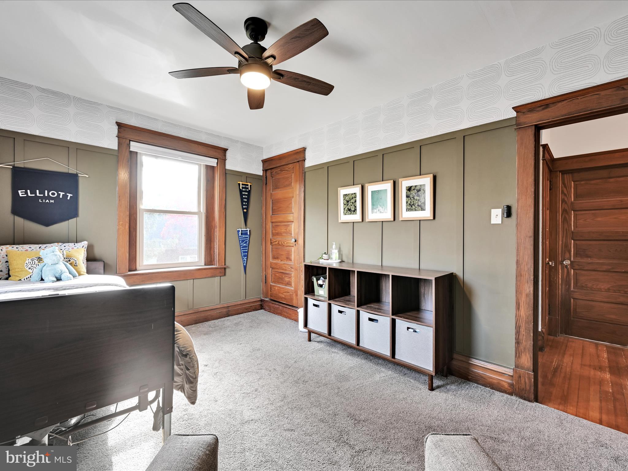 28 Charles Road Lancaster, PA 17603 - Photo 21 of 45 a living room with furniture and a window