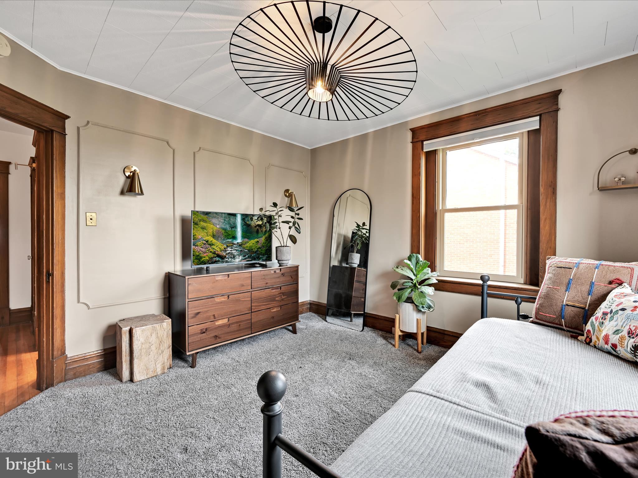 28 Charles Road Lancaster, PA 17603 - Photo 23 of 45 a living room with furniture and a large window