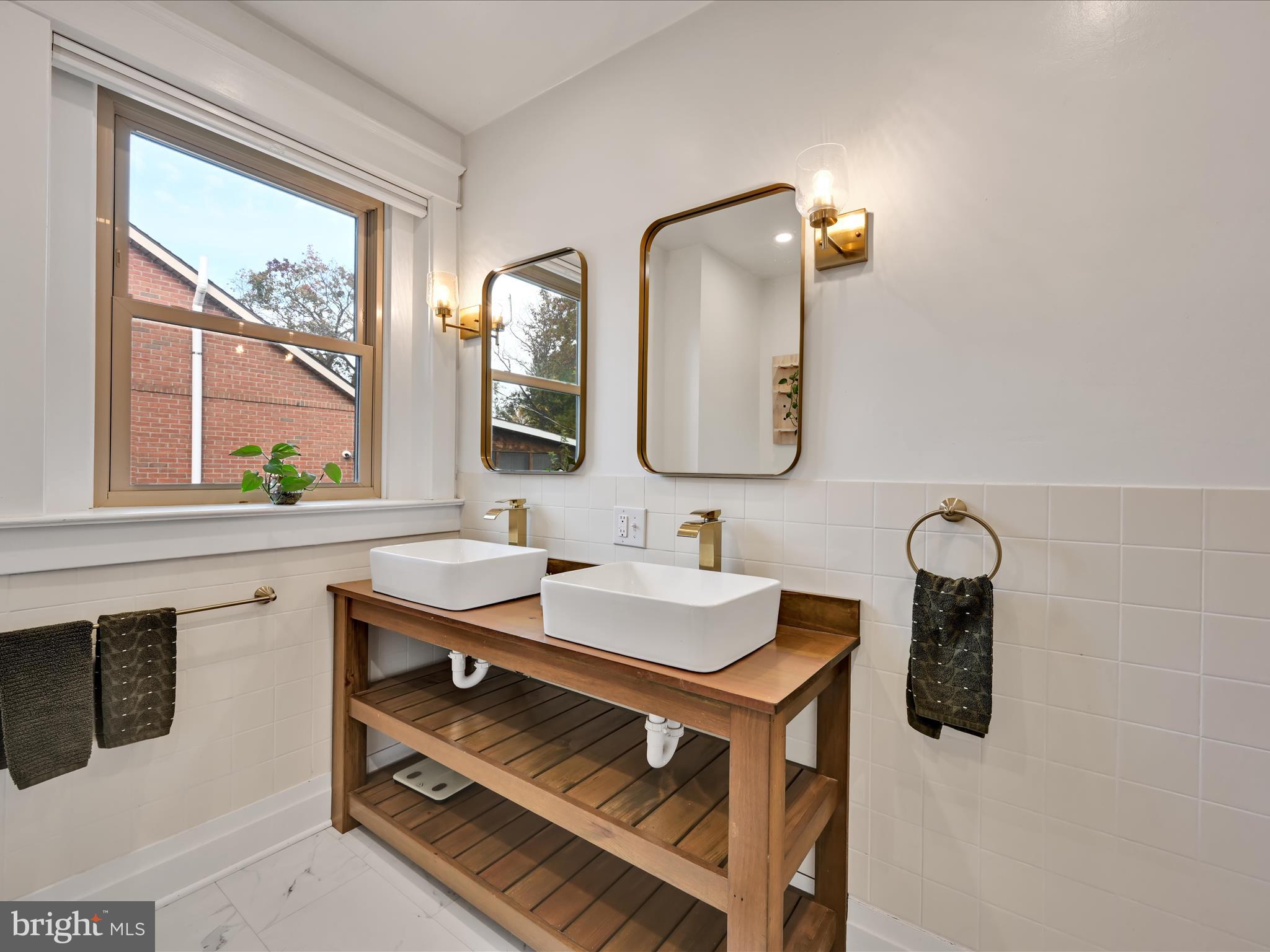 28 Charles Road Lancaster, PA 17603 - Photo 27 of 45 a bathroom with a sink vanity and mirror
