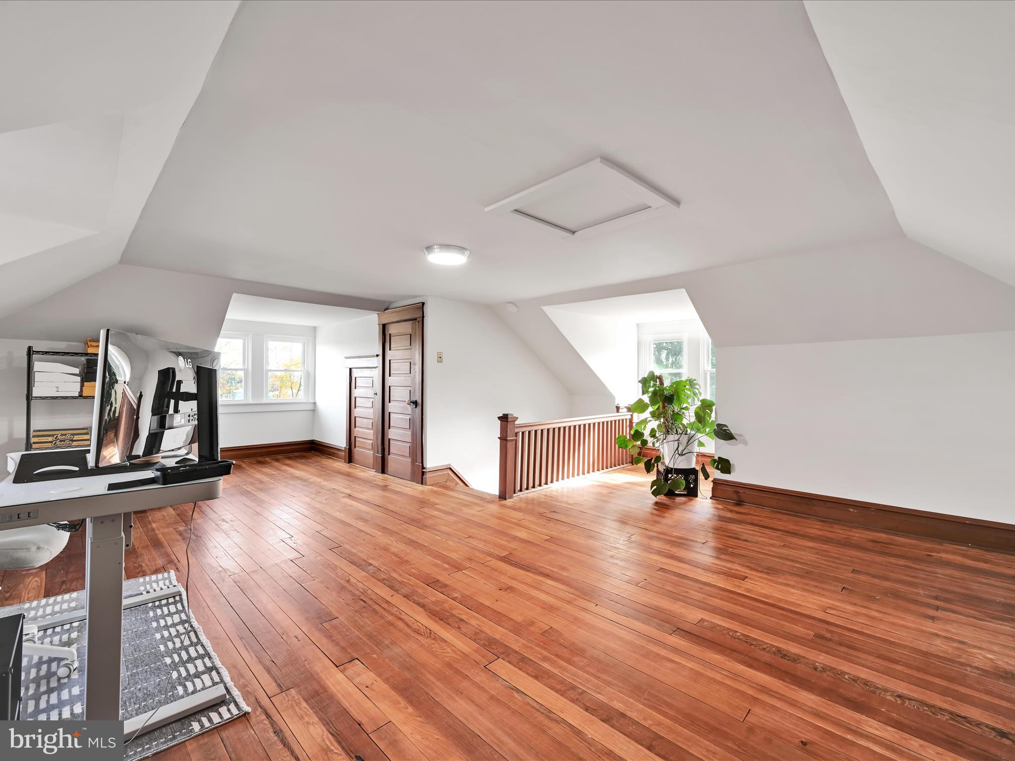 28 Charles Road Lancaster, PA 17603 - Photo 29 of 45 a view of an empty room with wooden floor and a window