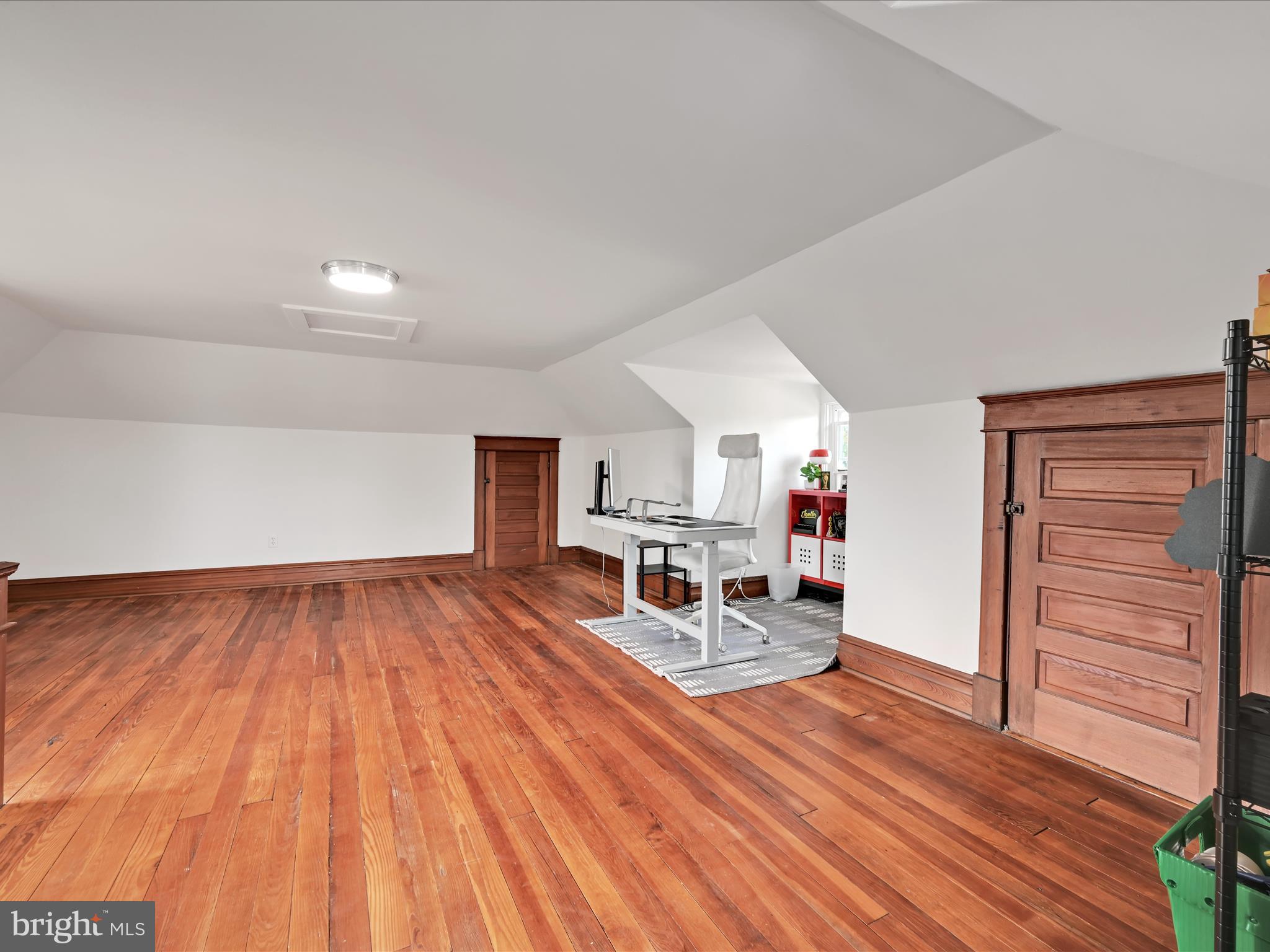 28 Charles Road Lancaster, PA 17603 - Photo 30 of 45 a living room with furniture and a wooden floor