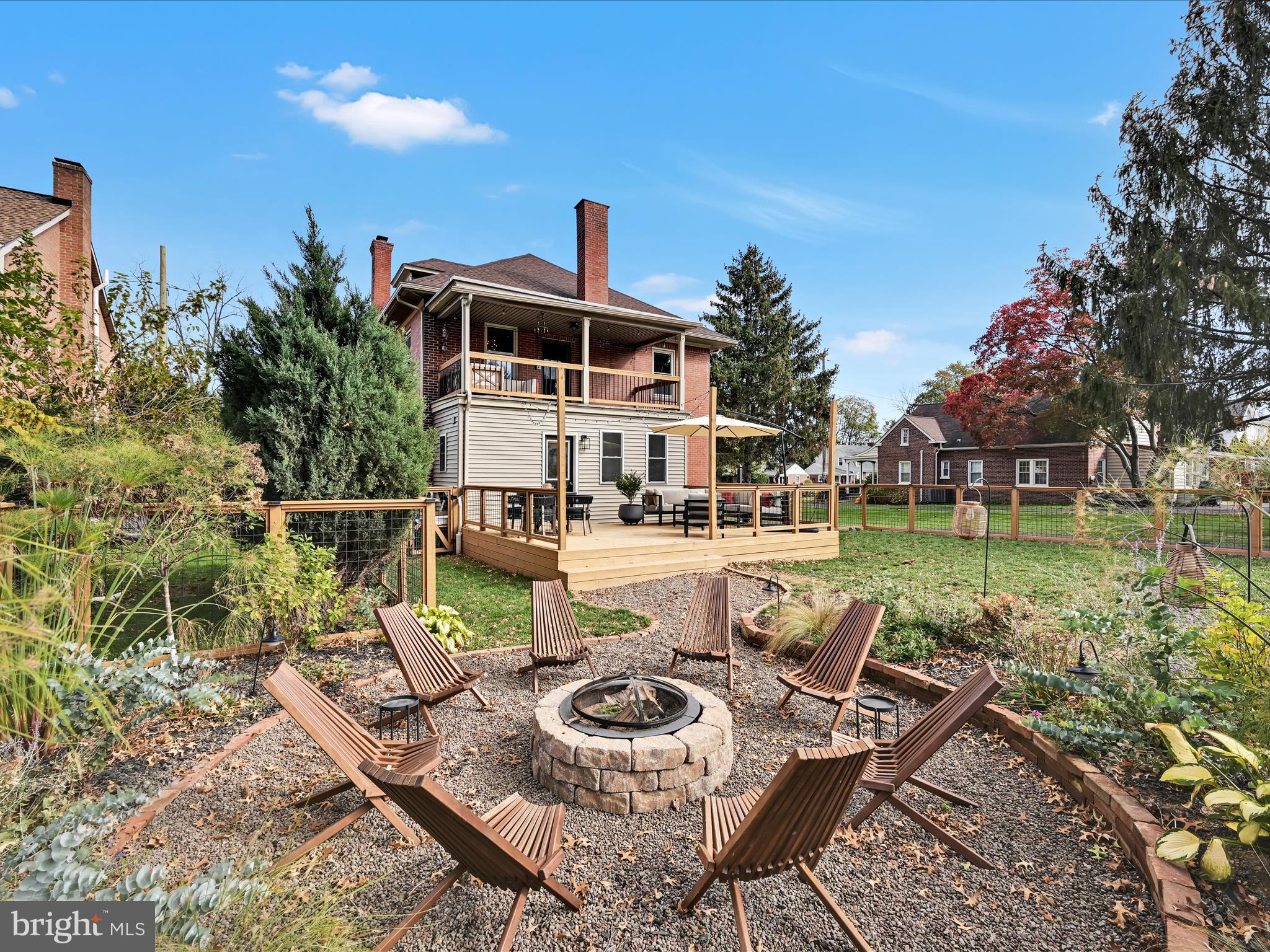 28 Charles Road Lancaster, PA 17603 - Photo 32 of 45 a view of a lake with couches chairs and a table