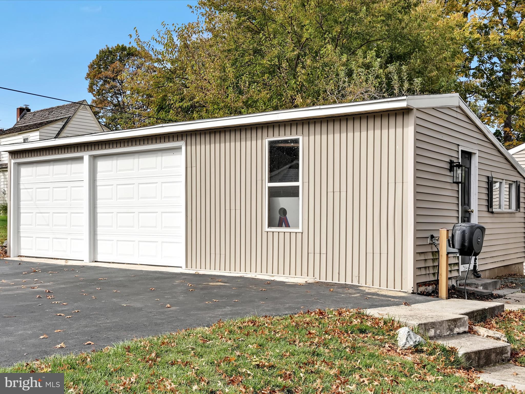 28 Charles Road Lancaster, PA 17603 - Photo 38 of 45 a view of a backyard with a large tree