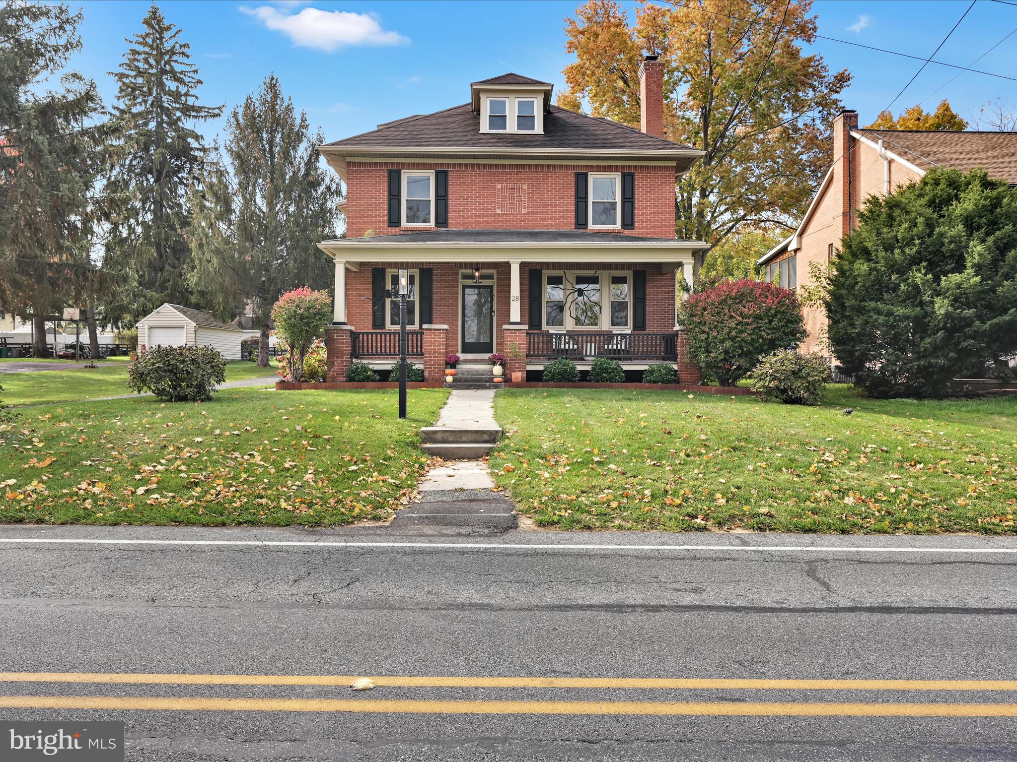 28 Charles Road Lancaster, PA 17603 - Photo 39 of 45 a front view of a house with a garden
