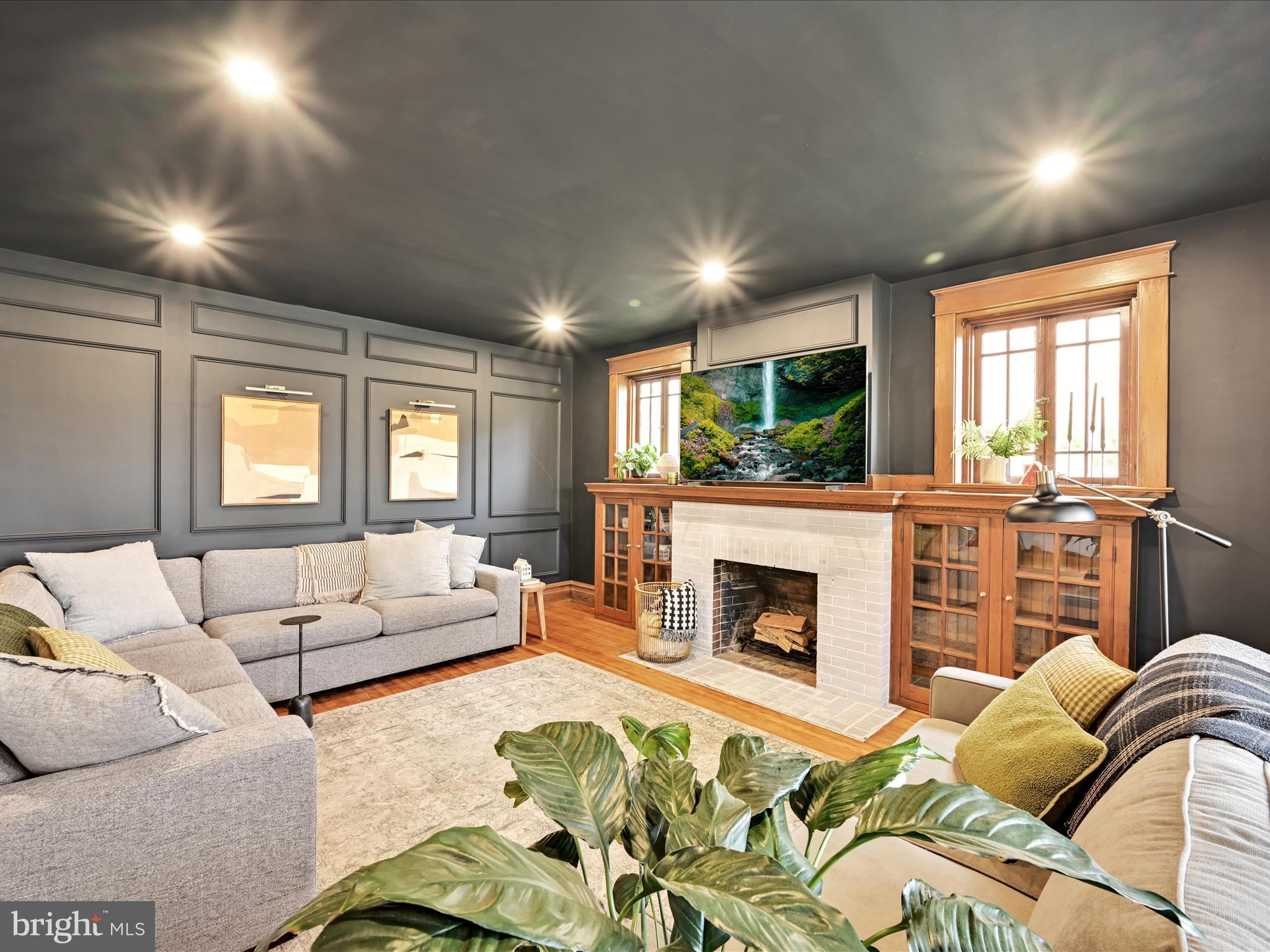 28 Charles Road Lancaster, PA 17603 - Photo 7 of 45 a living room with furniture fireplace and flat screen tv