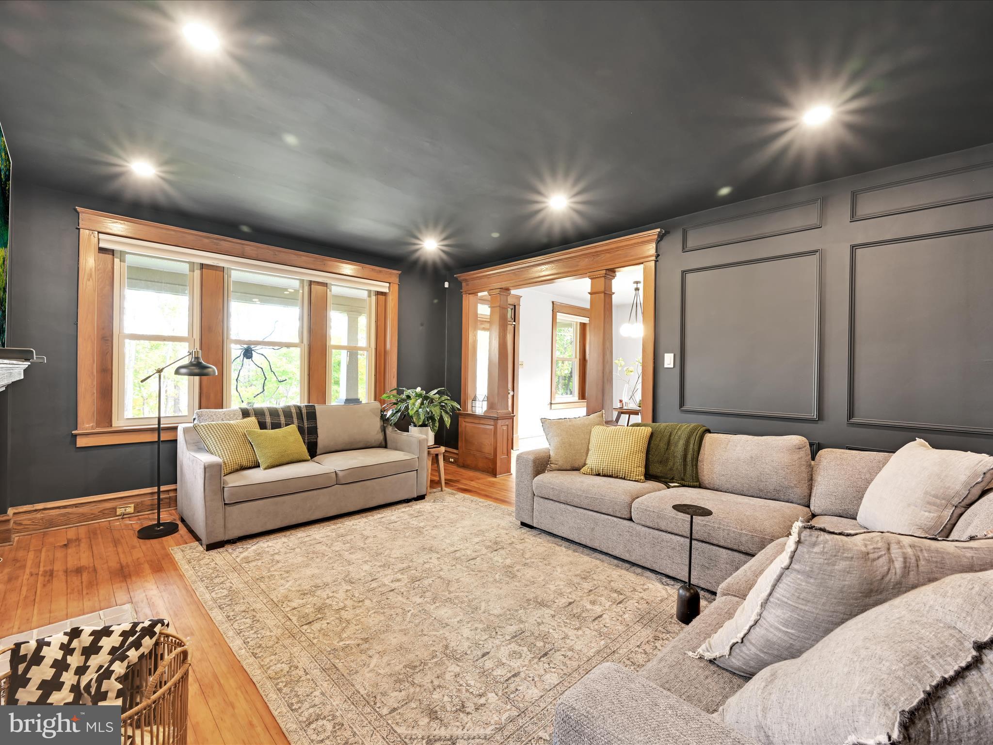 28 Charles Road Lancaster, PA 17603 - Photo 8 of 45 a living room with furniture and a large window